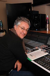 Man at sound board.