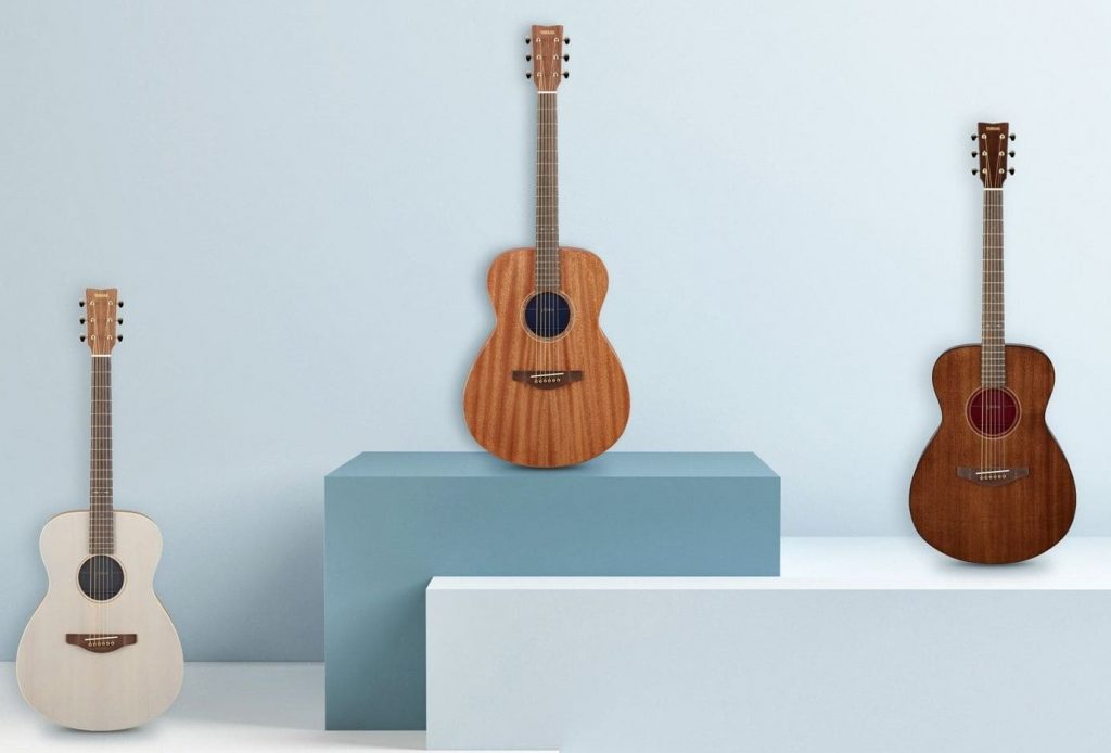 Three acoustic guitars.