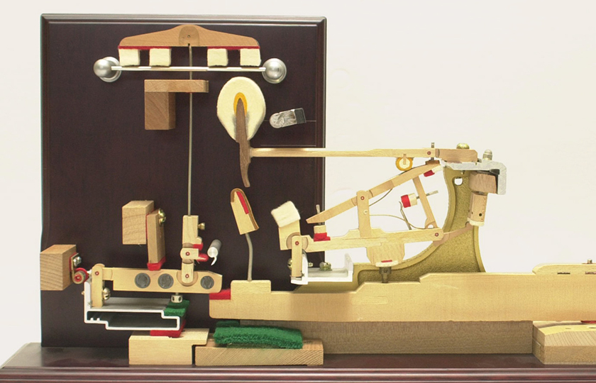 Piano-action Graphic showing a mechanism for testing key's weighting.