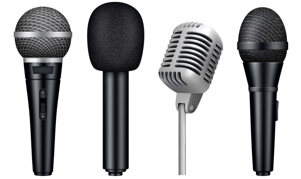 Four different types of microphones seen in closeup.