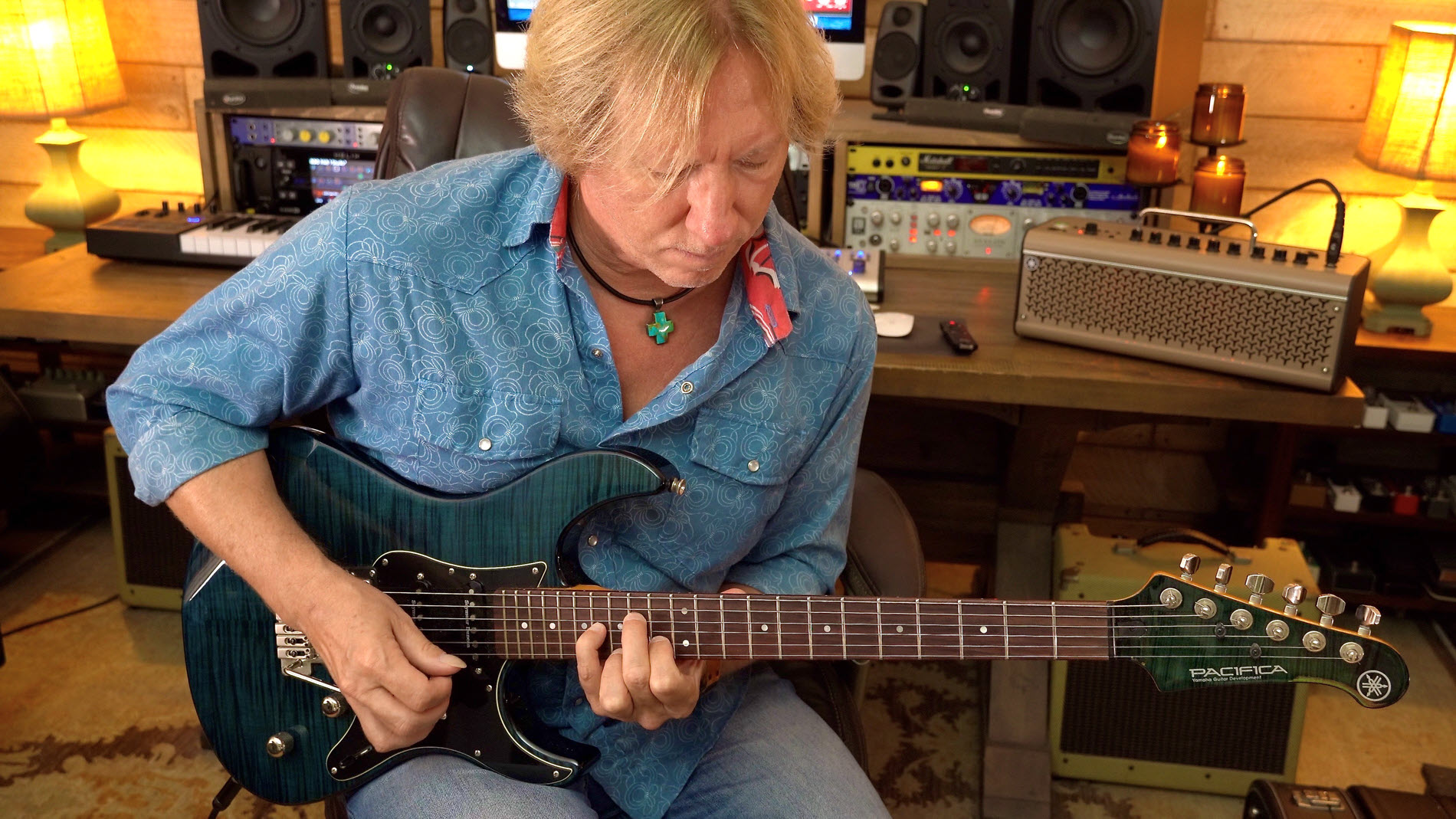 Pacifica-612-resized Author playing electric guitar in his home studio.