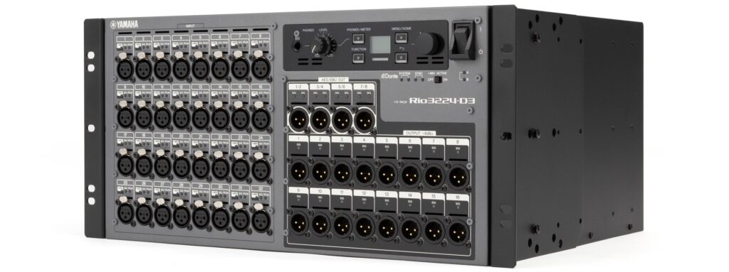 A rack unit with many connectors, two knobs and a mini-LCD display.